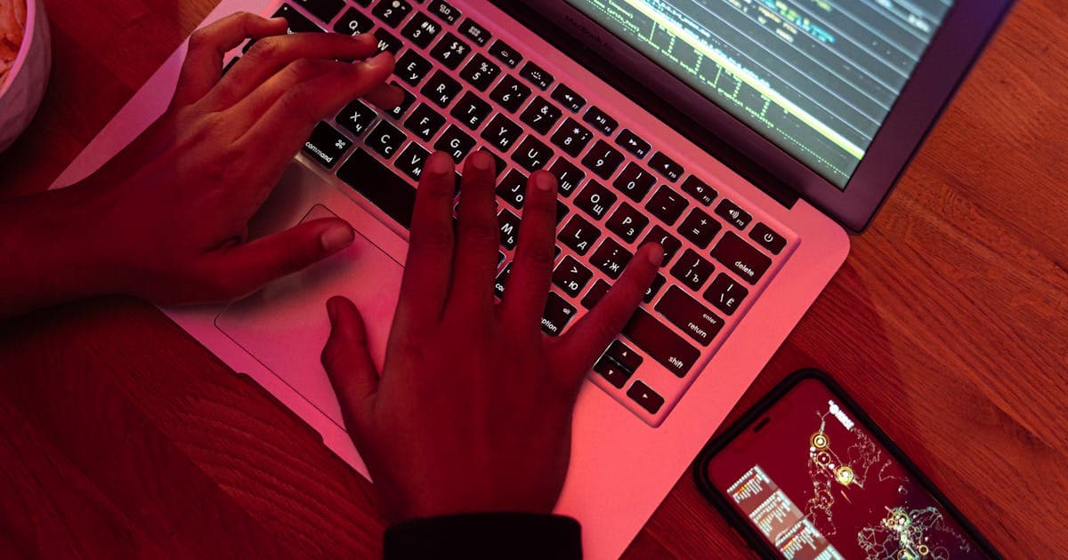 Code on laptop representing website security headers